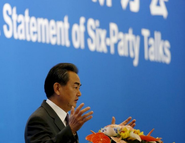 Chinese Foreign Minister Wang Yi delivers a speech during the international seminar commemorating the 10th anniversary of the September 19 joint statement of six-party talks at the Diaoyutai State Guesthouse in Beijing, China, September 19, 2015. In 2005, North Korea reached an agreement with the United States, South Korea, China, Japan and Russia to suspend its nuclear program in return for diplomatic rewards and energy assistance. REUTERS/Kim Kyung-Hoon