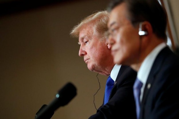 U.S. President Donald Trump and South Koreaís President Moon Jae-in hold a news conference at South Koreaís presidential Blue House in Seoul, South Korea, November 7, 2017. REUTERS/Jonathan Ernst - RC129247C700