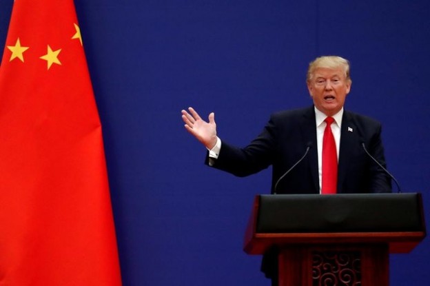 U.S. President Donald Trump delivers his speech as he and China's President Xi Jinping meet business leaders at the Great Hall of the People in Beijing, China, November 9, 2017. REUTERS/Damir Sagolj - RC1638424430