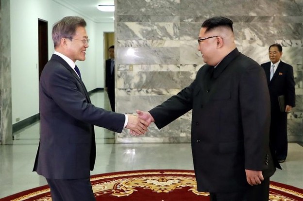 South Korean President Moon Jae-in is greeted by North Korean leader Kim Jong Un during their summit at the truce village of Panmunjom, North Korea, in this handout picture provided by the Presidential Blue House on May 26, 2018. Picture taken on May 26, 2018.     The Presidential Blue House /Handout via REUTERS ATTENTION EDITORS - THIS IMAGE WAS PROVIDED BY A THIRD PARTY - RC15570BB490