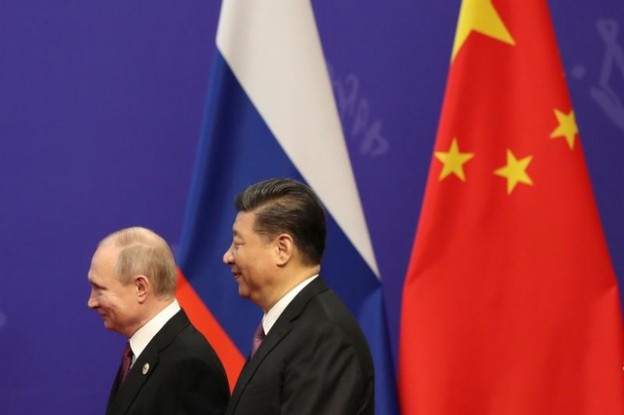 Russian President Vladimir Putin and Chinese President Xi Jinping attend the Tsinghua Universityís ceremony at Friendship Palace in Beijing, China April 26, 2019. Kenzaburo Fukuhara/Pool via REUTERS - RC1981B87520
