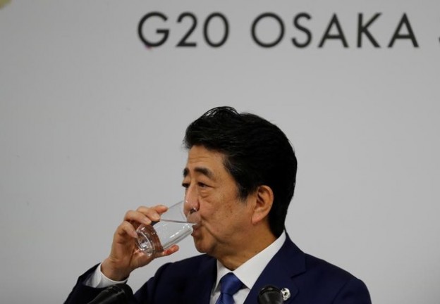 Japan's Prime Minister Shinzo Abe attends a news conference at the final day of the the G20 leaders summit in Osaka, Japan June 29, 2019. REUTERS/Jorge Silva - RC157C3464E0