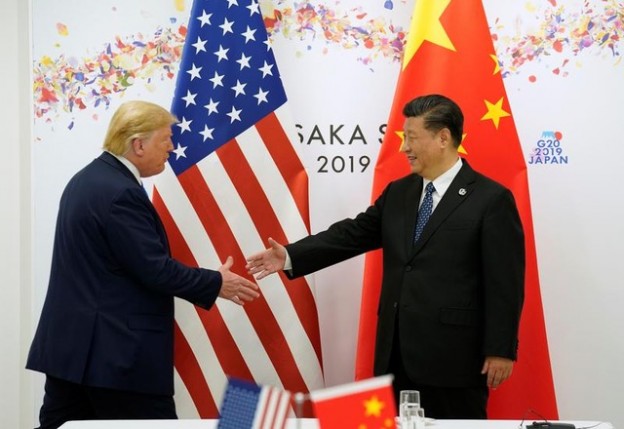 U.S. President Donald Trump and China's President Xi Jinping shake hands before their bilateral meeting during the G20 leaders summit in Osaka, Japan, June 29, 2019. REUTERS/Kevin Lamarque - RC1CAFDD7A30