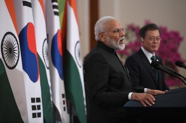 Indian Prime Minister Narendra Modi speaks as South Korea's President Moon Jae-in listens to during a joint press conference after their meeting at the presidential Blue House in Seoul on February 22, 2019. Jung Yeon-je/Pool via REUTERS - RC1DEAC748A0
