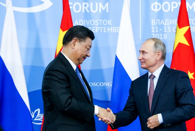 Chinese President Xi Jinping shakes hands with Russian President Vladimir Putin during a signing ceremony following the Russian-Chinese talks on the sidelines of the Eastern Economic Forum in Vladivostok, Russia September 11, 2018. Alexander Ryumin/TASS Host Photo Agency/Pool via REUTERS - RC1CCD778AD0