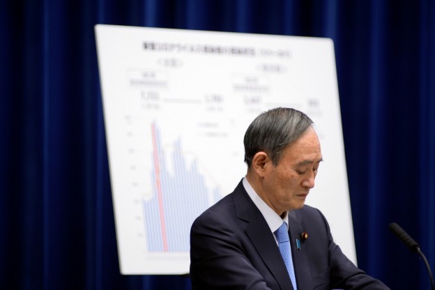 Japan's Prime Minister Yoshihide Suga addresses a news conference on the coronavirus disease (COVID-19) situation at the prime minister's official residence in Tokyo, Japan February 2, 2021. David Mareuil/Pool via REUTERS - RC2CKL9MKN7C